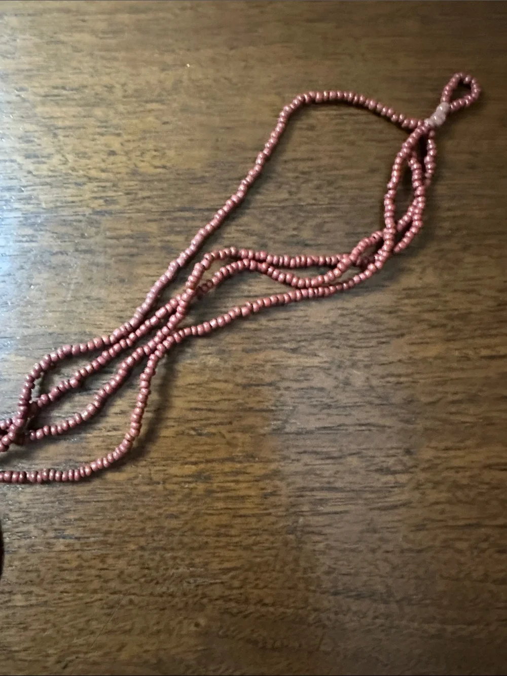 Multi-Strand Red Beaded Necklace with Iridescent Shell Pendant